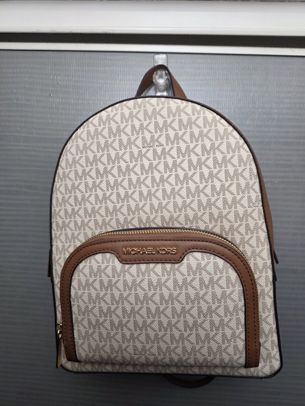 Michael Kors Signature Logo Backpack in Vanilla